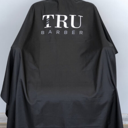 TRUBARBER PROFESSIONAL BARBER CAPE - Black With White Letters