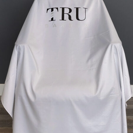 TRUBARBER PROFESSIONAL BARBER CAPE - White With Black Letters